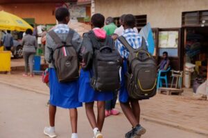 A clear photo of learners heading home for a holiday break in the past