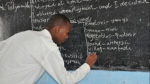 A P1 Teacher in class attending a lesson to learners at a school in Eastern Kenya