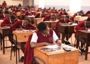 A clear photo of form four students sitting for a KCSE Exam paper in the past