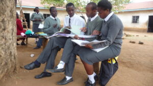 A clear photo of Migori TTC Students taking part in exam revision in the past